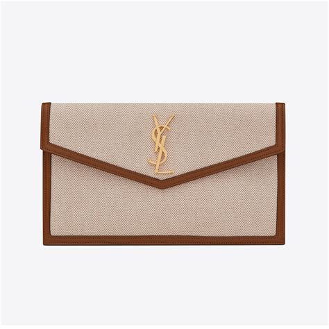 ysl uptown clutch bag|UPTOWN pouch in canvas and smooth leather .